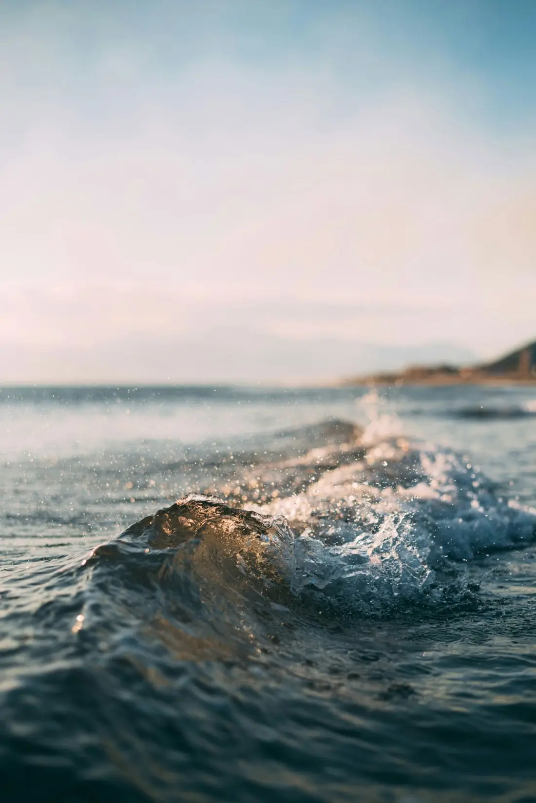 Golden-hour wave breaking off the Santa Barbara coast