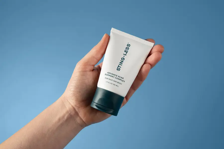 Sting-Less Advance Scar Support Complex tube held in hand